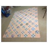Peach and Multicolored Floral Patchwork Quilt