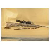 Remington Model 597 Semi-Auto Rifle In .17 HMR Caliber With A Simmons Scope,