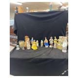 Ceramic Figurines, Straw Doll, Glassware, Nesting Boxes, and Ceramic Hand Display