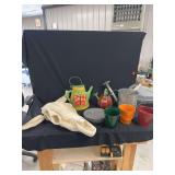 Decorative Garden Planters, Watering Cans, Plates, and Skull Replica