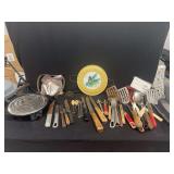 Kitchenware Assortment Including Electric Burner, Utensils, and Decorative Tray