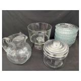 Assorted Glassware Including Pitcher, Pedestal Bowl, Lidded Jar, and Stacked Bowls