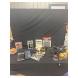 Electronics and Office Supplies Assembly Featuring Sanyo Portable Cassette Player and Texas Instruments Spell-Checker
