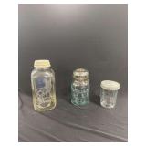 Set of Three Embossed Glass Storage Jars including Ball and Atlas