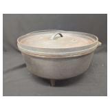 Lodge Cast Iron Camp Dutch Oven Number 12 with Lid and Three Legs
