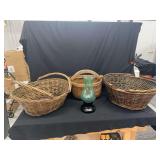 Three Woven Baskets and One Glass Oil Lamp with Black Base
