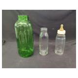 Assorted Glass Bottles Including Green Glass Jug and Graduated Cylinders