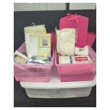 Storage Totes with Textiles and Bound Volumes
