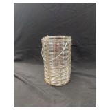 Clear Glass Cylinder Vase Enclosed in Rust-Patinated Wire Cage with Metal Bail Handle