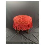 Upholstered Footstool with Red Jacquard Pattern and Fringe