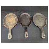 Three Lodge Cast Iron Skillets
