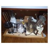 Kitchen Appliance Assortment Including Blenders and Food Processors