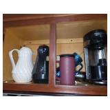Kitchenware Assortment Featuring Coffee Maker and Thermal Carafes