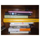 Assorted Fiction and Non-Fiction Hardcover and Paperback Book Stacks