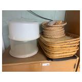 Stacked Wicker Trays, Baskets, and Plastic Food Storage Containers