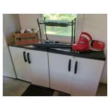 Troy-Bilt Leaf Blower, Black and Decker Work Surface, and Associated Tools