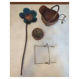 Mixed Decorative Home Decor Items Including Metal Flower, Copper Basin, Wire Basket, and Stone Sculpture