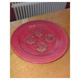 Red Glazed Ceramic Plate with Fleur-de-lis Motifs