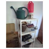Four-Tier Plastic Utility Shelf with Household Contents