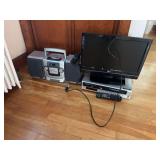 Electronics Package Including LG Flat Screen Television Sylvania VCR DVD Player and Emerson Sound System