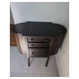 Dark Stained Wooden Drop-Leaf Sewing Cabinet with Three Drawers