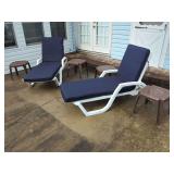 Patio Set with Two White Lounge Chairs, Blue Cushions, and Four Brown Side Tables