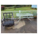 Patio Set Including Swivel Armchair, Glass Top Table, Planter, and Plastic Stool