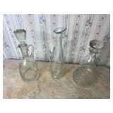Three Clear Glass Vessels Including Decanters and Pitcher