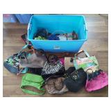 Assorted Handbags and Totes in Various Materials and Styles