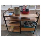 Metal Frame Rolling Utility Cart with Shelves, Plastic Tubs, and Various Household Accessories