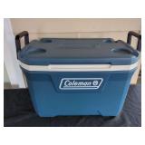 The Coleman Company Model 5860 Blue Plastic Cooler