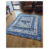 Blue and White Applique Quilt with Floral and Eagle Motifs