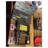 Automotive Tool Assortment Including Socket Sets and Tire Repair Kit