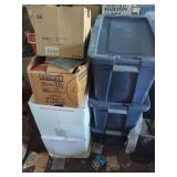 Storage Totes And Cardboard Boxes Containing Books And Kitchenware