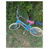 Two Blue Bicycles Including Schwinn Model