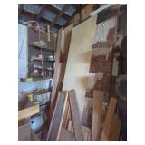 Assorted Lumber, Shelving, and Vehicle Rims