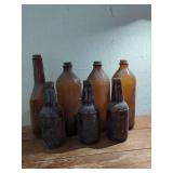 Amber Glass Clorox and Embossed Soda Bottles Set