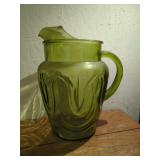 Green Glass Water Pitcher with Molded Scroll Motif