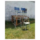 Two Folding Chairs and Three Mobility Aids