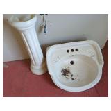 White Ceramic Pedestal Sink with Shell Motif