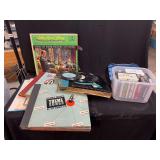 Audio Media Assortment Featuring Vinyl Albums and Audio Cassettes