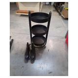 Black Metal Three-Tier Rolling Cart and Black Leather Roller Skates with Blue Wheels