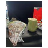 Ceramic Green Pitcher and Woven Multicolored Throw Blanket