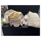 Textile Bundle in Blue Plastic Laundry Basket