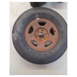Goodyear Wrangler ST P245/75R16 Tire Mounted on Steel Rim