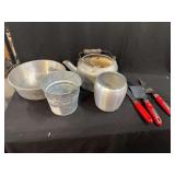 Kitchenware Assortment Featuring Aluminum Cookware Galvanized Pail and Red Handled Utensils
