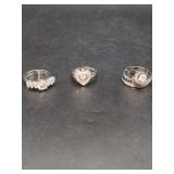Three White Metal and Clear Stone Rings