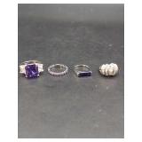 Four Piece Set of Purple and Clear Stone Silver-Tone Rings