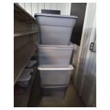Stack of Four Plastic Storage Totes