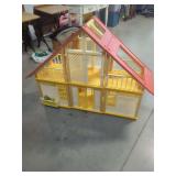 Plastic Dollhouse with Red Shingle Roof and Yellow Balconies